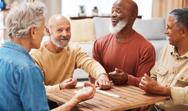 a group of men sitting around a table
