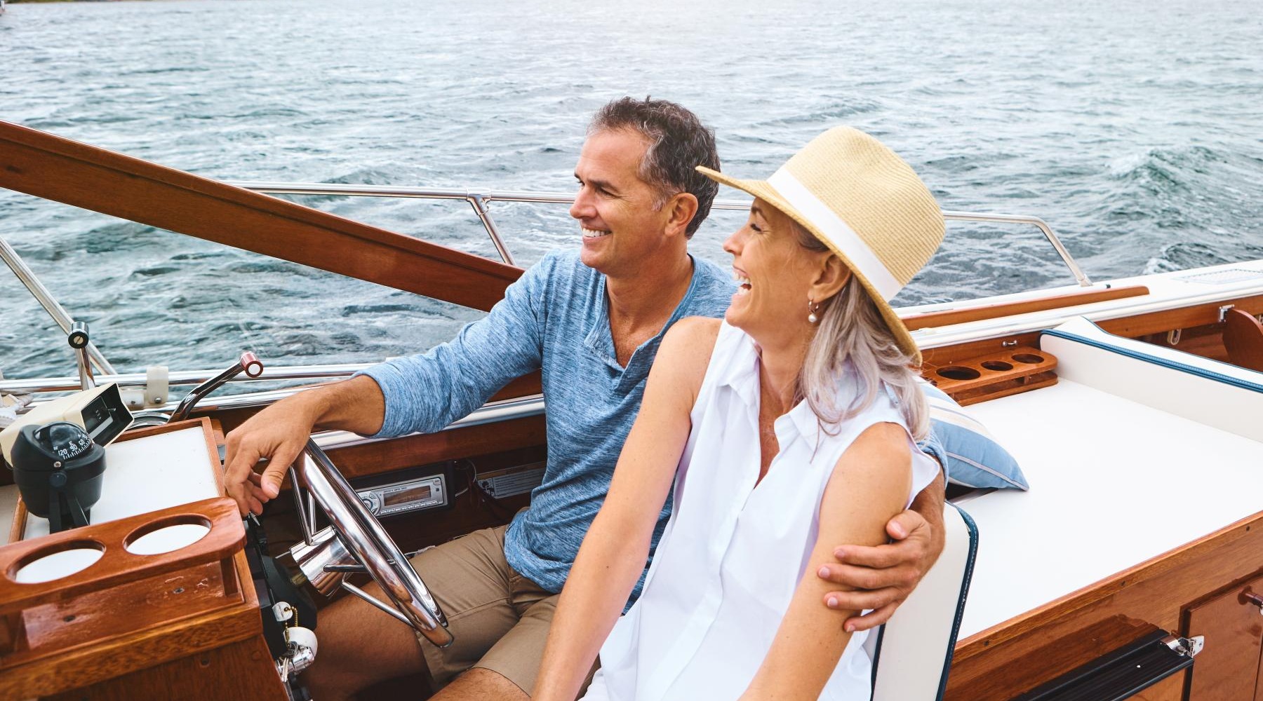 a man and woman on a boat