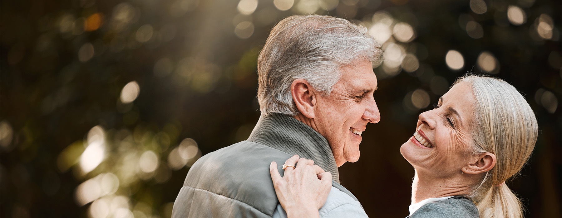 A couple hugging and smiling