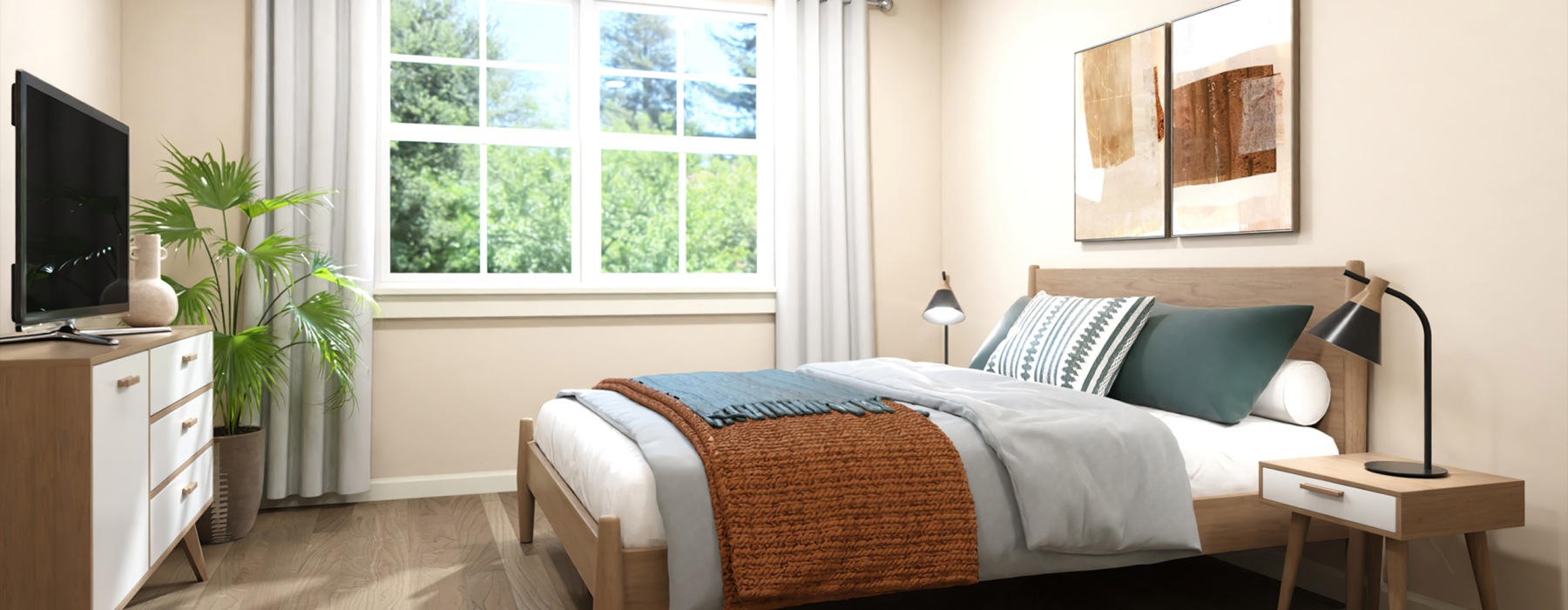 a bed in a bedroom next to a large window