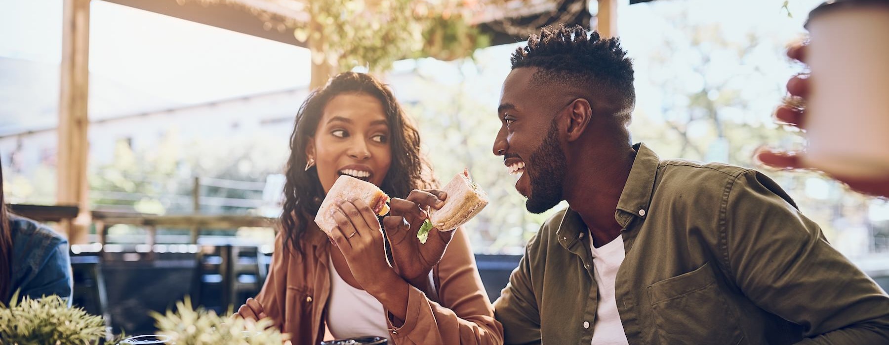 a man and a woman eating at a table